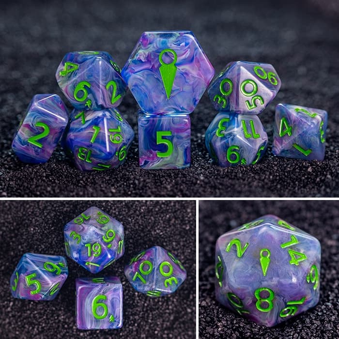 Caster's Coven 8-piece resin RPG dice set on dark sand: swirls of blues, pinks, purples, & more